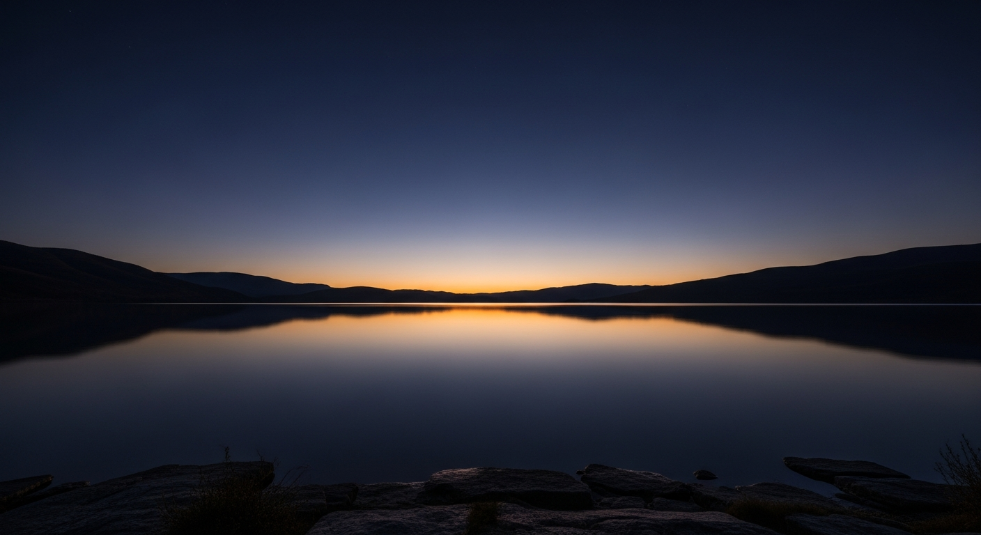 First thin line of dawn breaking over a still dark body of water at the horizon, representing God speaking creation into being through His powerful prophetic words